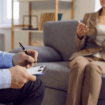 A woman speaking with a doctor.